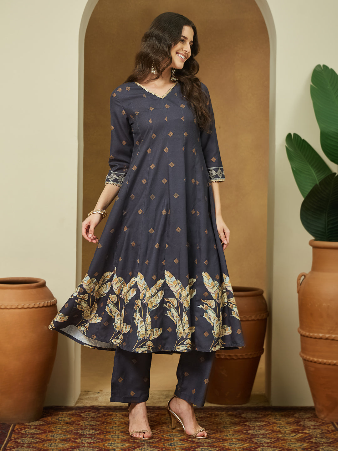 Janasya Women's Black Cotton Blend Embllished A-line Kurta Set