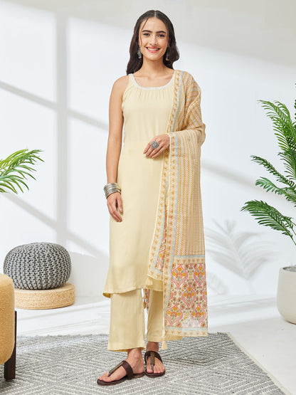 Janasya Women's Cream Rayon Solid Straight Kurta Set with Printed Dupatta