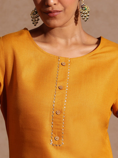Janasya Women's Mustard Cotton Blend Yoke Design Straight Kurta Set